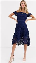 Chi Chi London bardot lace mini dress with flippy hem in navy από το Asos